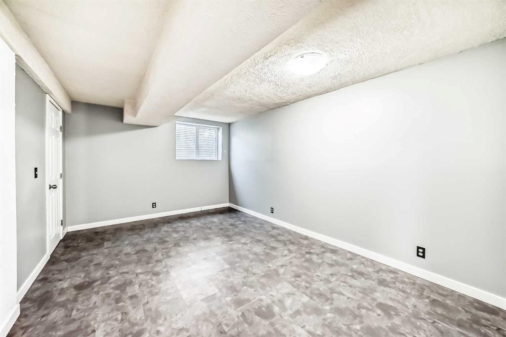63 Falshire Place Ne, Calgary, AB - Indoor Photo Showing Other Room