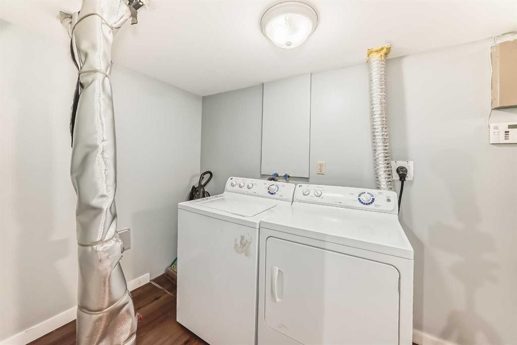 63 Falshire Place Ne, Calgary, AB - Indoor Photo Showing Laundry Room