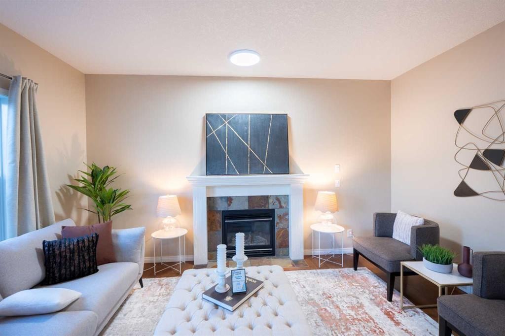 306 Rockyspring Circle Nw, Calgary, AB - Indoor Photo Showing Living Room With Fireplace