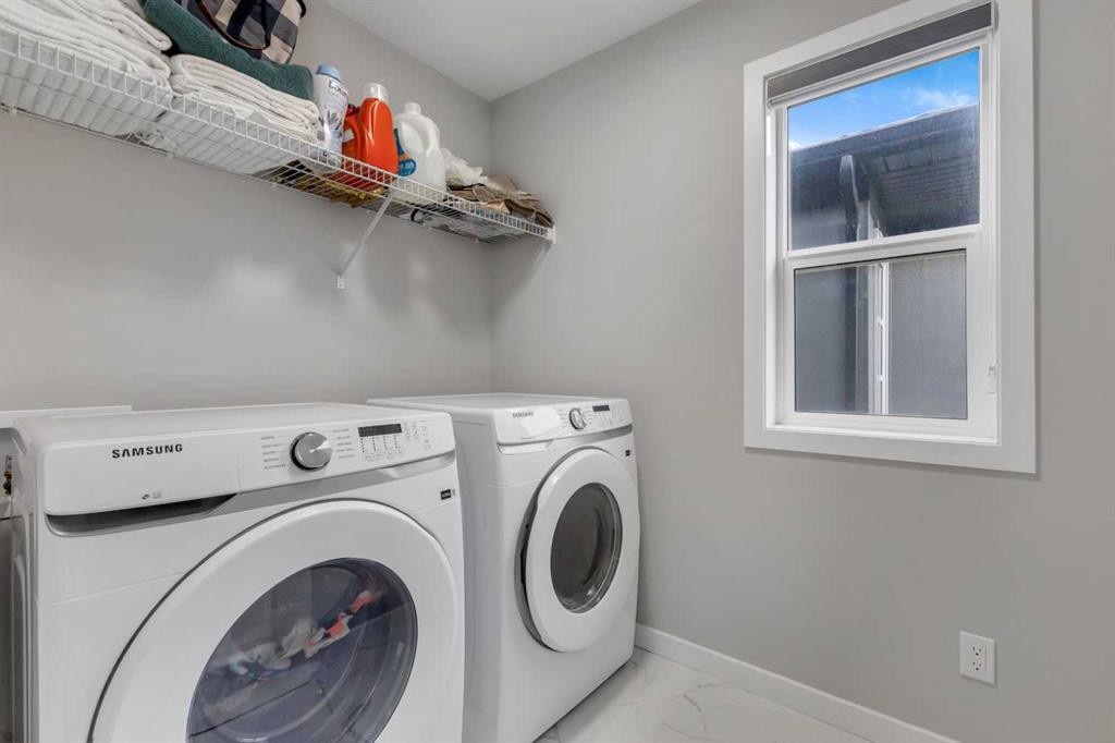 704 Creekstone Circle Sw, Calgary, AB - Indoor Photo Showing Laundry Room