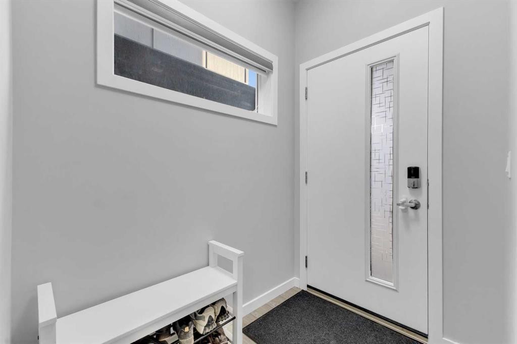 704 Creekstone Circle Sw, Calgary, AB - Indoor Photo Showing Other Room