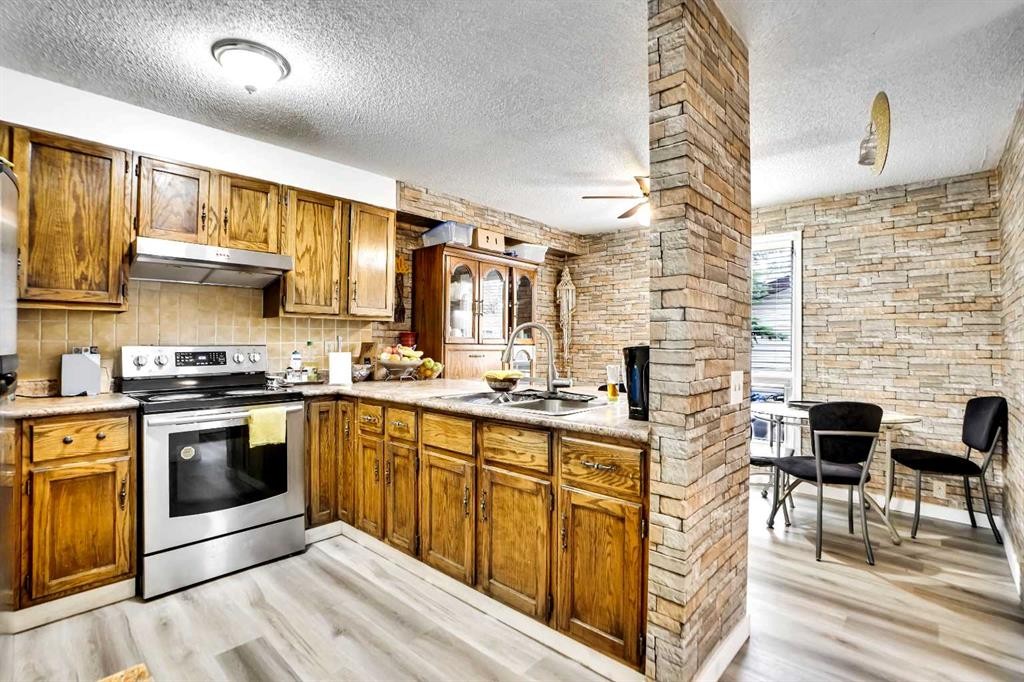 48 Templeridge Crescent Ne, Calgary, AB - Indoor Photo Showing Kitchen With Double Sink