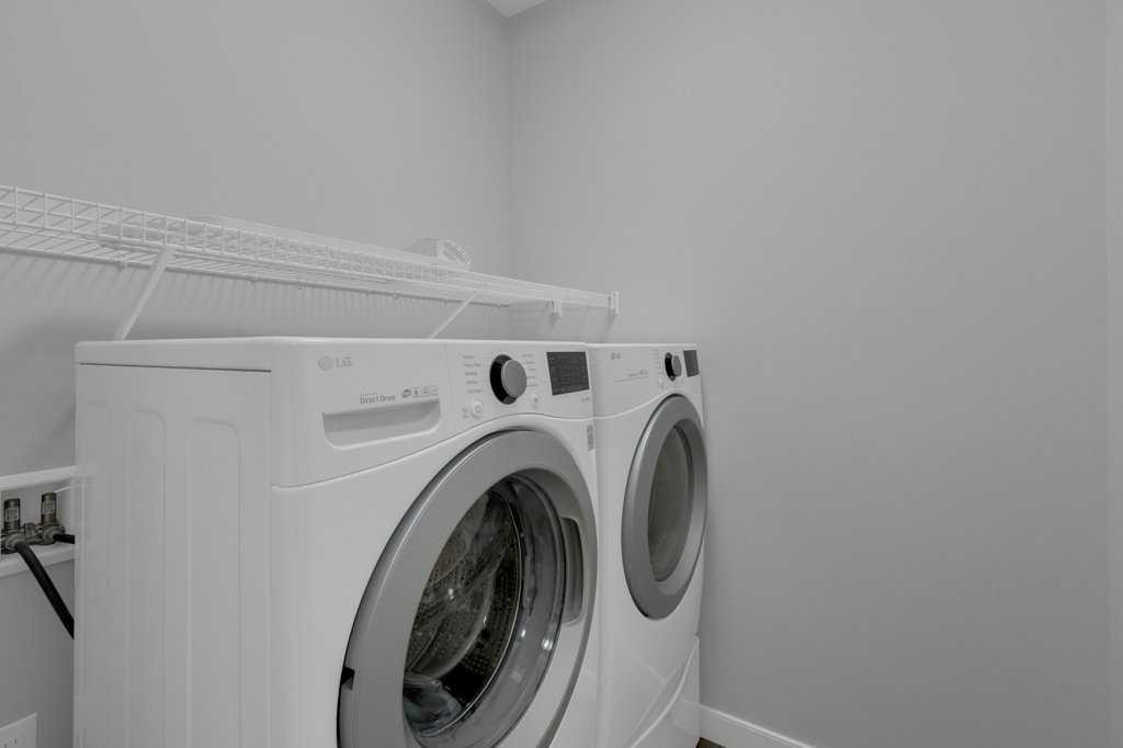 137 Willow Park North, Cochrane, AB - Indoor Photo Showing Laundry Room