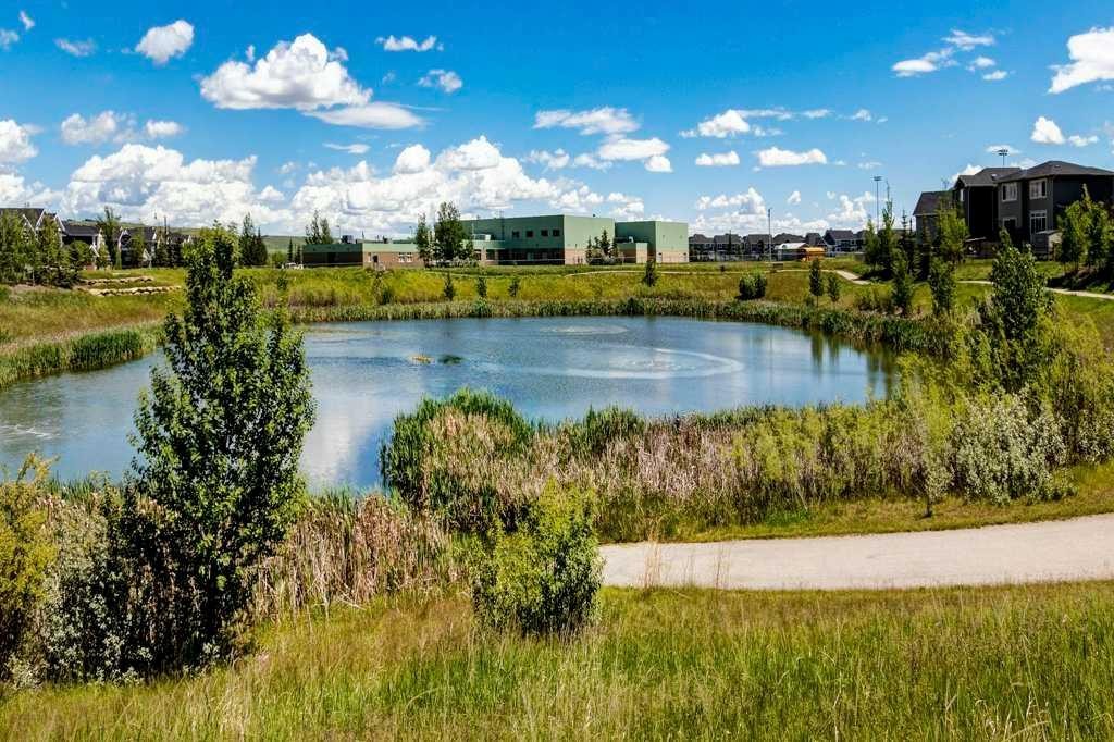 137 Willow Park North, Cochrane, AB - Outdoor With Body Of Water With View
