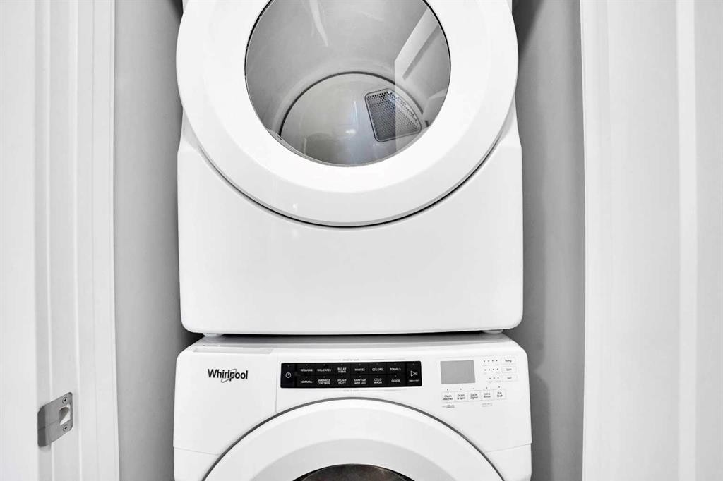 96 Tuscany Summit Square Nw, Calgary, AB - Indoor Photo Showing Laundry Room