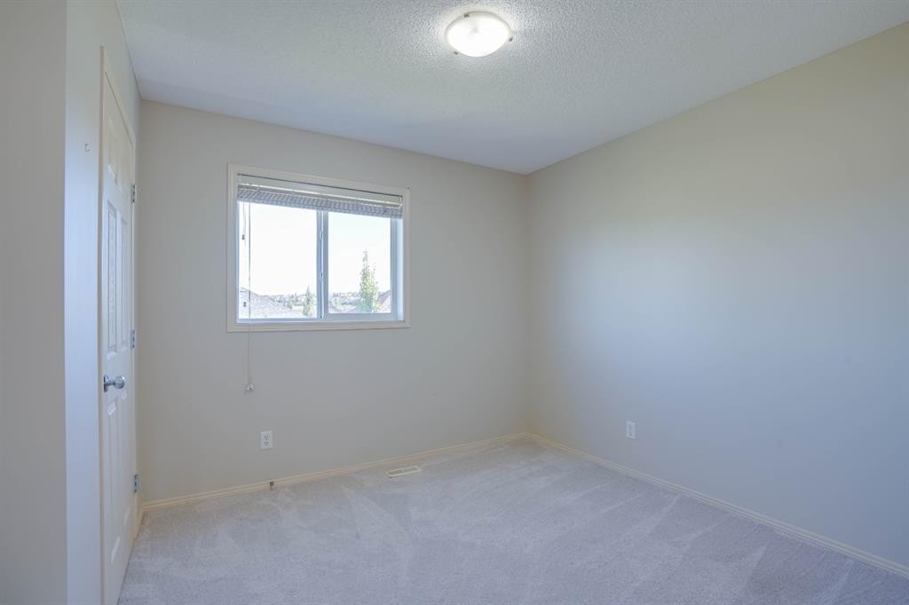 15 Tuscany Reserve Bay Nw, Calgary, AB - Indoor Photo Showing Other Room