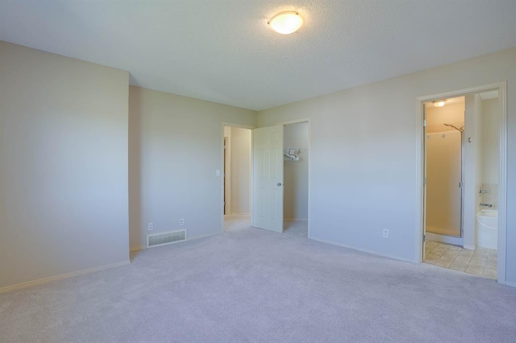 15 Tuscany Reserve Bay Nw, Calgary, AB - Indoor Photo Showing Other Room