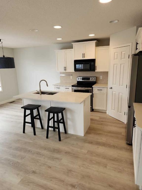 15 Tuscany Reserve Bay Nw, Calgary, AB - Indoor Photo Showing Kitchen With Stainless Steel Kitchen With Double Sink