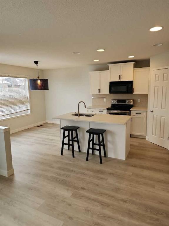15 Tuscany Reserve Bay Nw, Calgary, AB - Indoor Photo Showing Kitchen