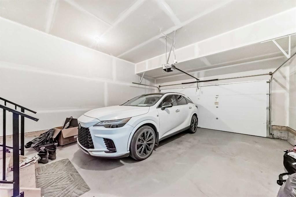 69 Amblehurst Way Nw, Calgary, AB - Indoor Photo Showing Garage