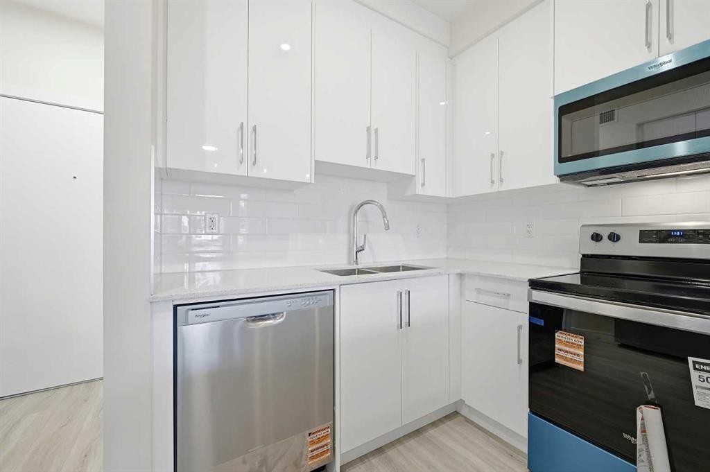 2106-15 Skyview Point Crescent Ne, Calgary, AB - Indoor Photo Showing Kitchen With Double Sink With Upgraded Kitchen