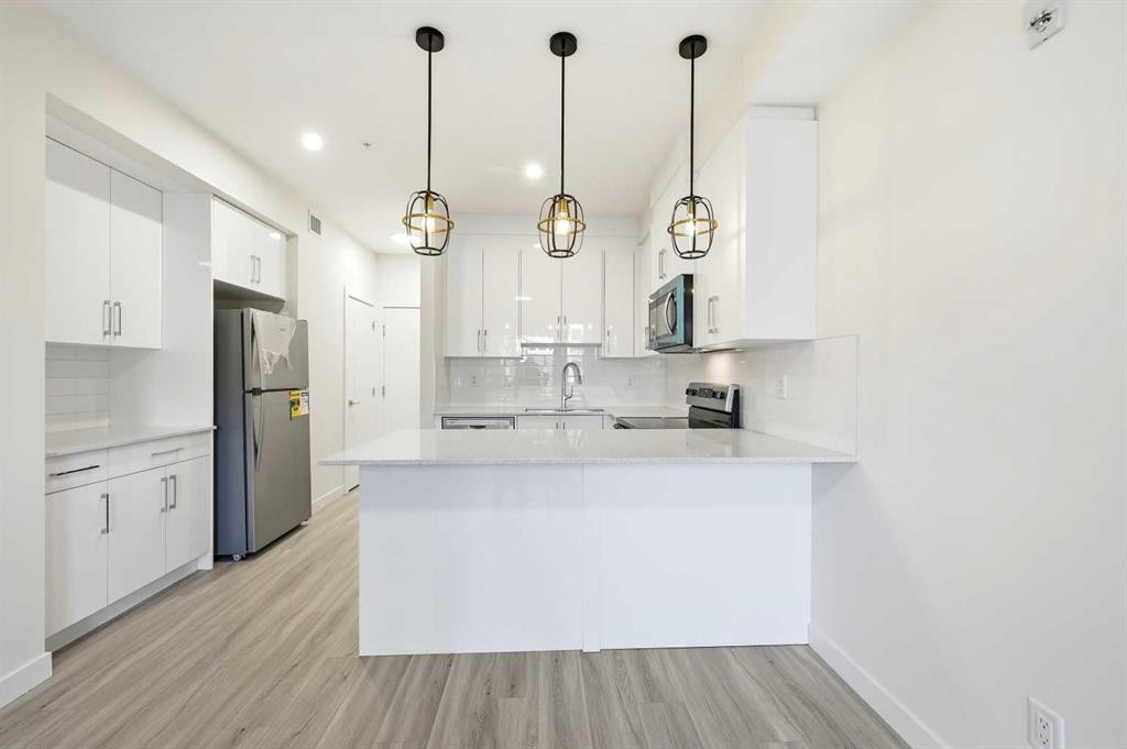 2106-15 Skyview Point Crescent Ne, Calgary, AB - Indoor Photo Showing Kitchen With Upgraded Kitchen