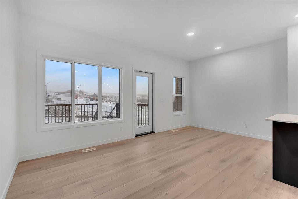 35 Heritage Heath, Cochrane, AB - Indoor Photo Showing Other Room