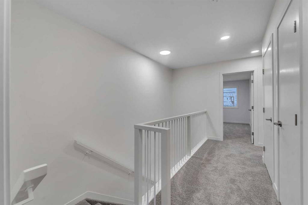 35 Heritage Heath, Cochrane, AB - Indoor Photo Showing Other Room