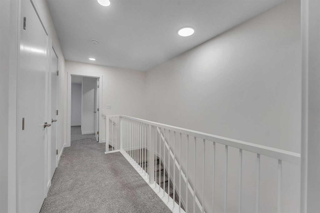 35 Heritage Heath, Cochrane, AB - Indoor Photo Showing Other Room