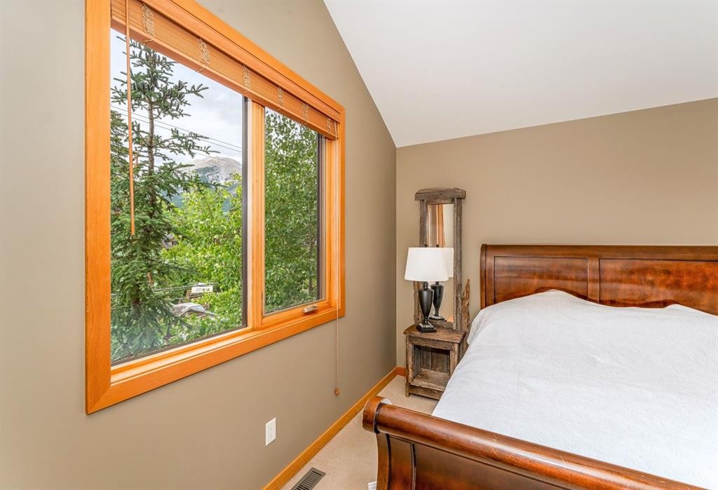 2-722 3Rd Street, Canmore, AB - Indoor Photo Showing Bedroom
