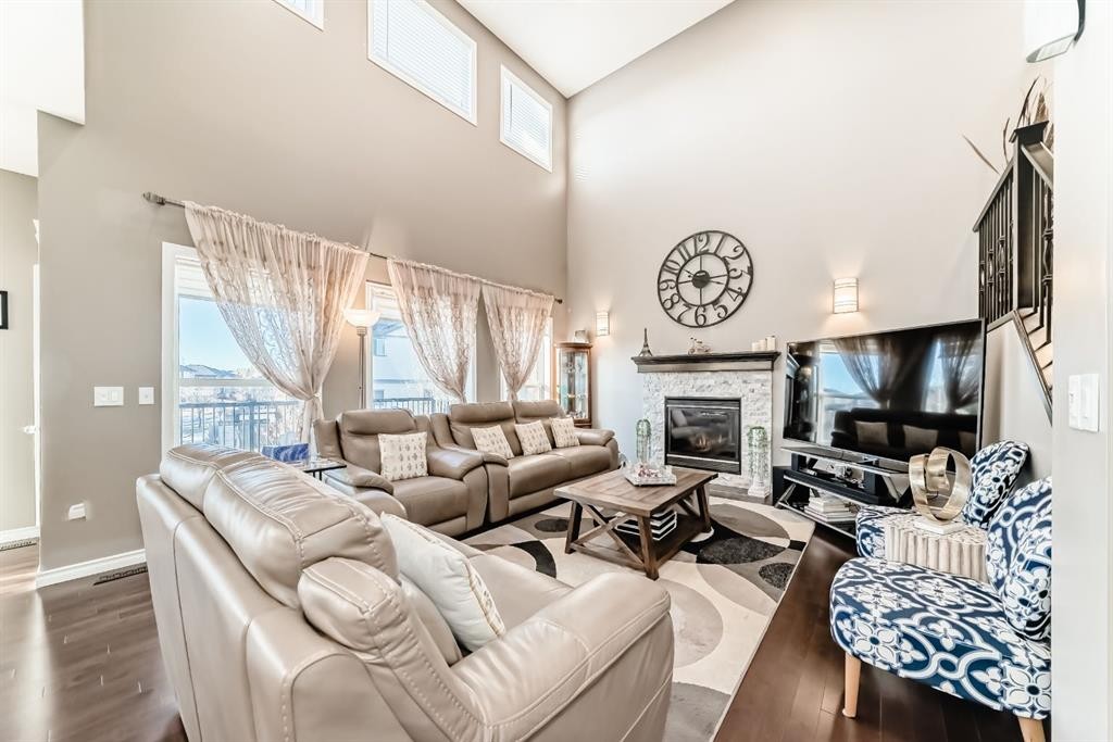 108 Seagreen Lane, Chestermere, AB - Indoor Photo Showing Living Room With Fireplace