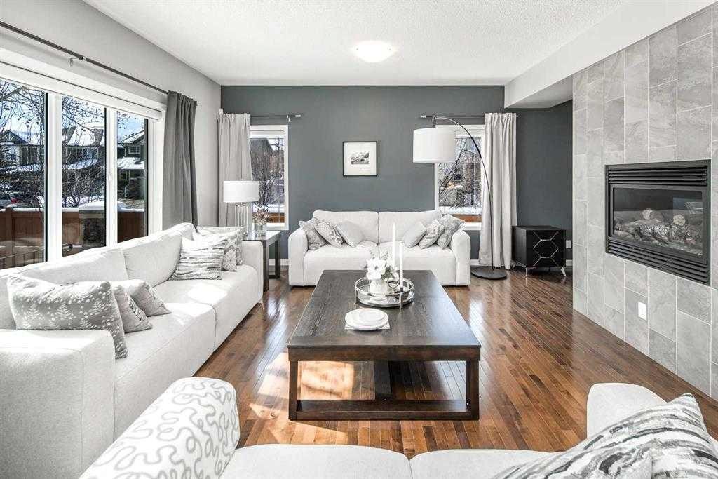 5 Panatella Square Nw, Calgary, AB - Indoor Photo Showing Living Room With Fireplace