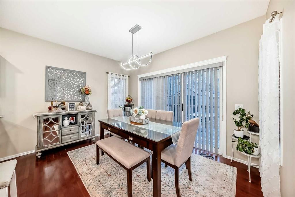 719 Panamount Boulevard Nw, Calgary, AB - Indoor Photo Showing Dining Room