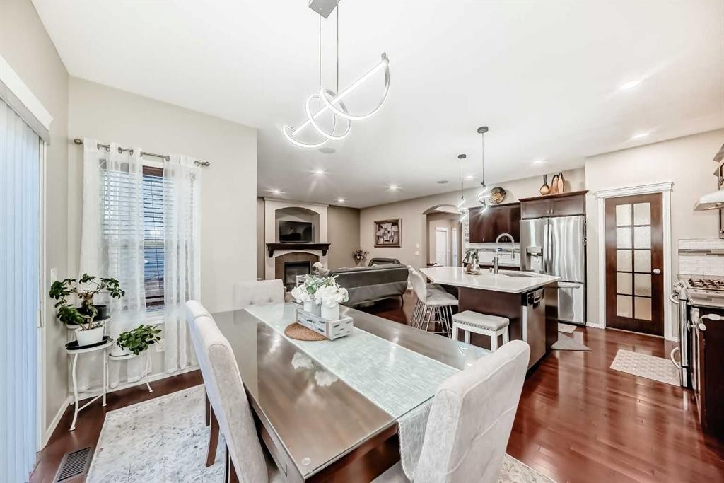 719 Panamount Boulevard Nw, Calgary, AB - Indoor Photo Showing Dining Room