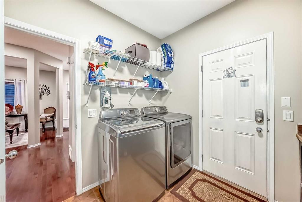 719 Panamount Boulevard Nw, Calgary, AB - Indoor Photo Showing Laundry Room