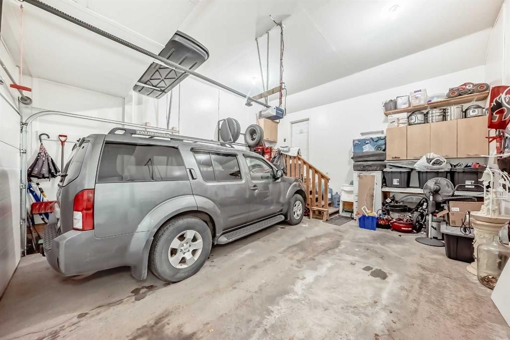 719 Panamount Boulevard Nw, Calgary, AB - Indoor Photo Showing Garage