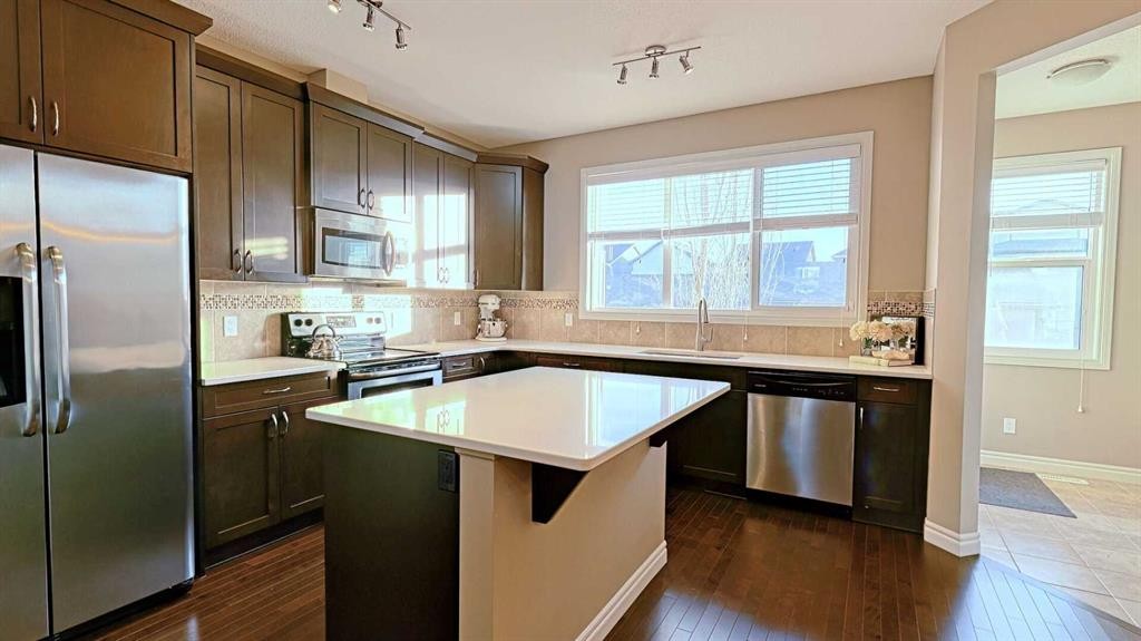 12 Legacy Gate Se, Calgary, AB - Indoor Photo Showing Kitchen With Stainless Steel Kitchen With Upgraded Kitchen