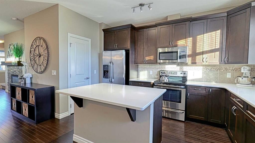 12 Legacy Gate Se, Calgary, AB - Indoor Photo Showing Kitchen With Stainless Steel Kitchen With Upgraded Kitchen