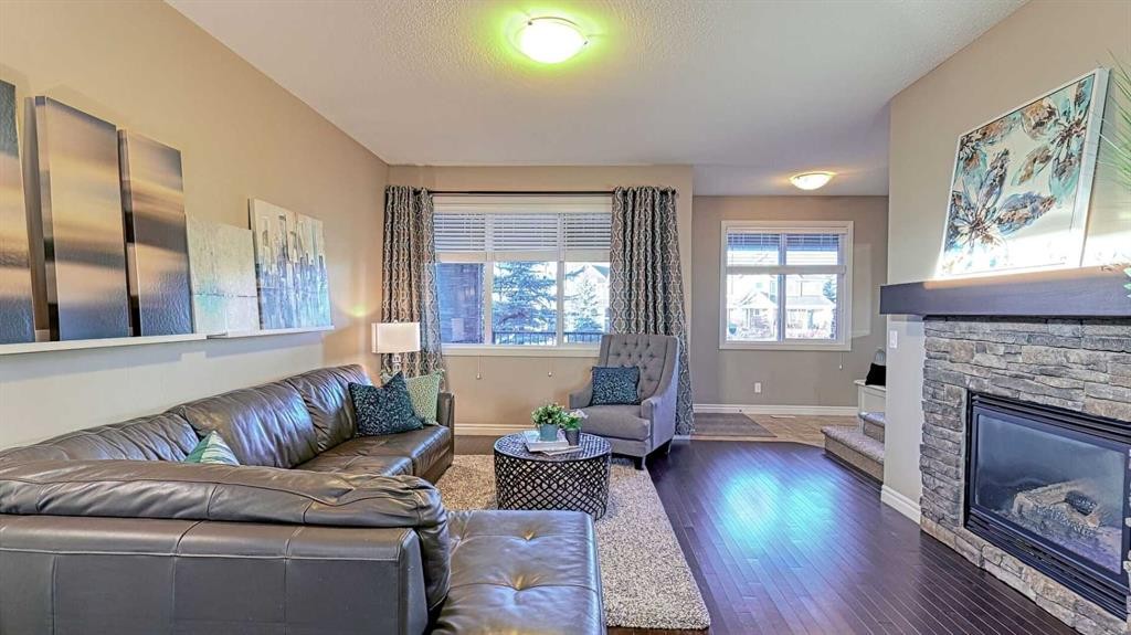 12 Legacy Gate Se, Calgary, AB - Indoor Photo Showing Living Room With Fireplace