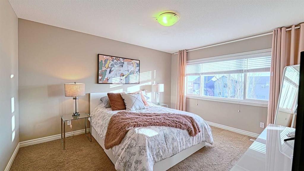 12 Legacy Gate Se, Calgary, AB - Indoor Photo Showing Bedroom