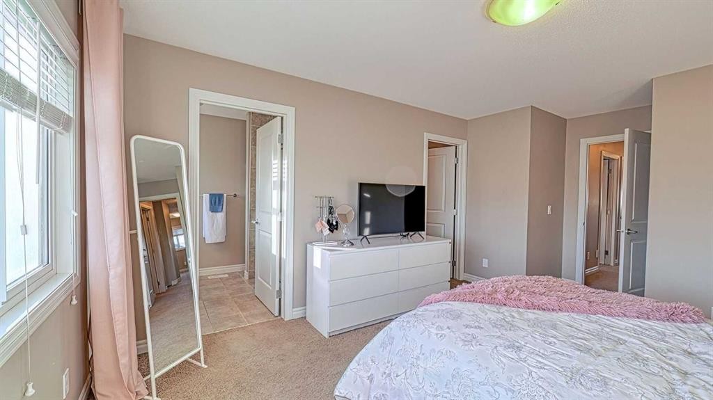 12 Legacy Gate Se, Calgary, AB - Indoor Photo Showing Bedroom