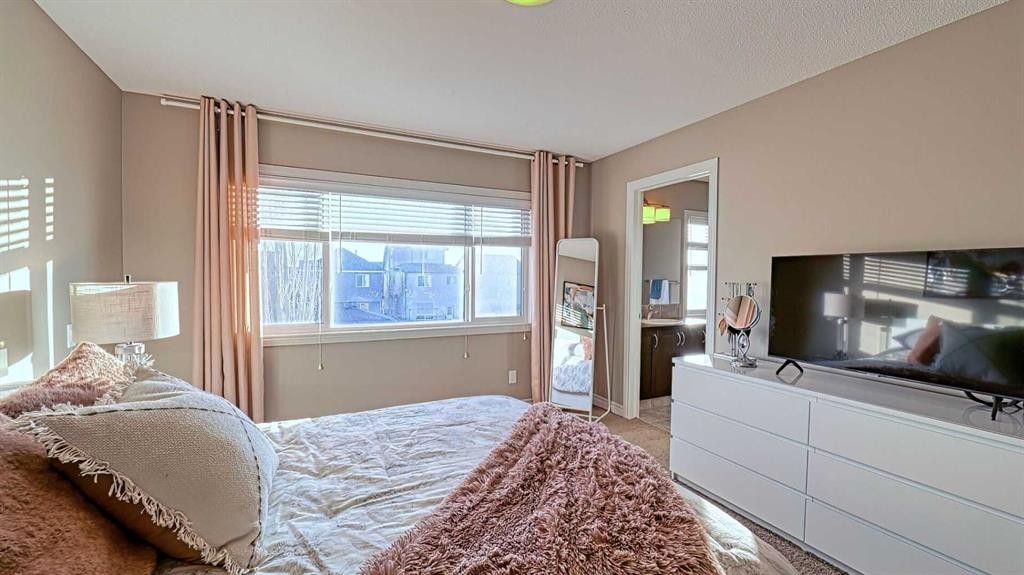 12 Legacy Gate Se, Calgary, AB - Indoor Photo Showing Bedroom