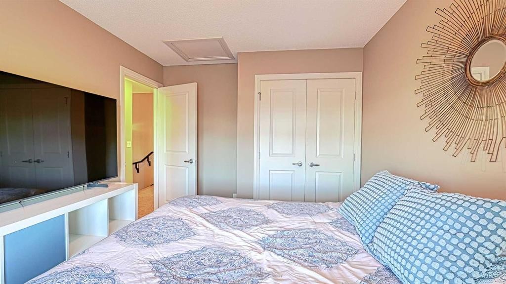 12 Legacy Gate Se, Calgary, AB - Indoor Photo Showing Bedroom