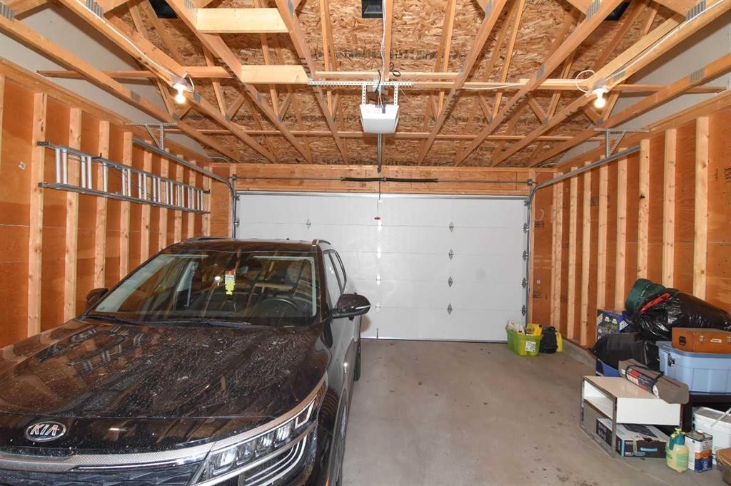12 Legacy Gate Se, Calgary, AB - Indoor Photo Showing Garage