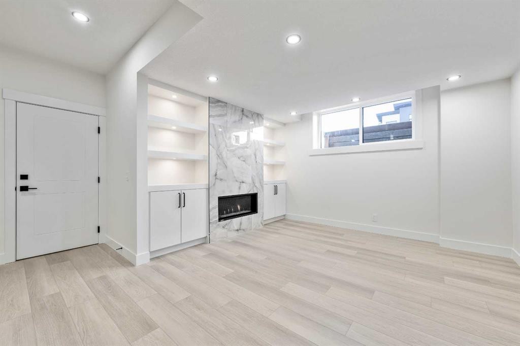 1417 42 Street Sw, Calgary, AB - Indoor Photo Showing Other Room With Fireplace