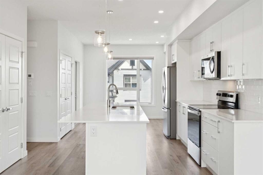 54 Evanscrest Manor Nw, Calgary, AB - Indoor Photo Showing Kitchen With Stainless Steel Kitchen With Upgraded Kitchen