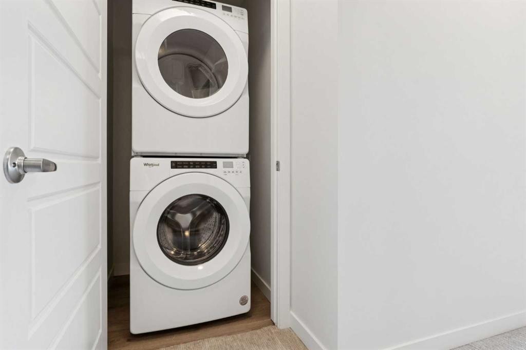 54 Evanscrest Manor Nw, Calgary, AB - Indoor Photo Showing Laundry Room