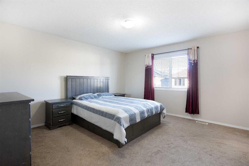 138 Saddlecrest Way Ne, Calgary, AB - Indoor Photo Showing Bedroom
