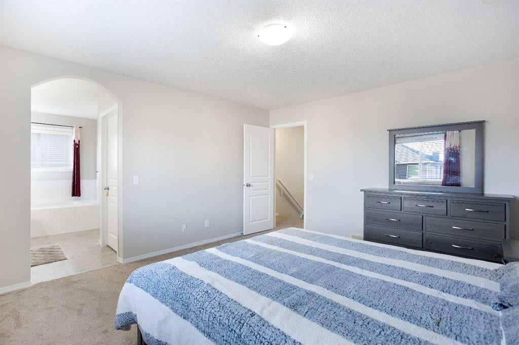 138 Saddlecrest Way Ne, Calgary, AB - Indoor Photo Showing Bedroom
