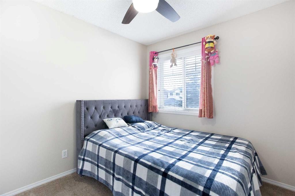 138 Saddlecrest Way Ne, Calgary, AB - Indoor Photo Showing Bedroom