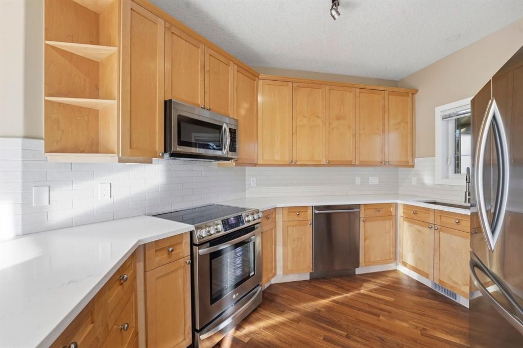 33 Prominence Park Sw, Calgary, AB - Indoor Photo Showing Kitchen With Stainless Steel Kitchen