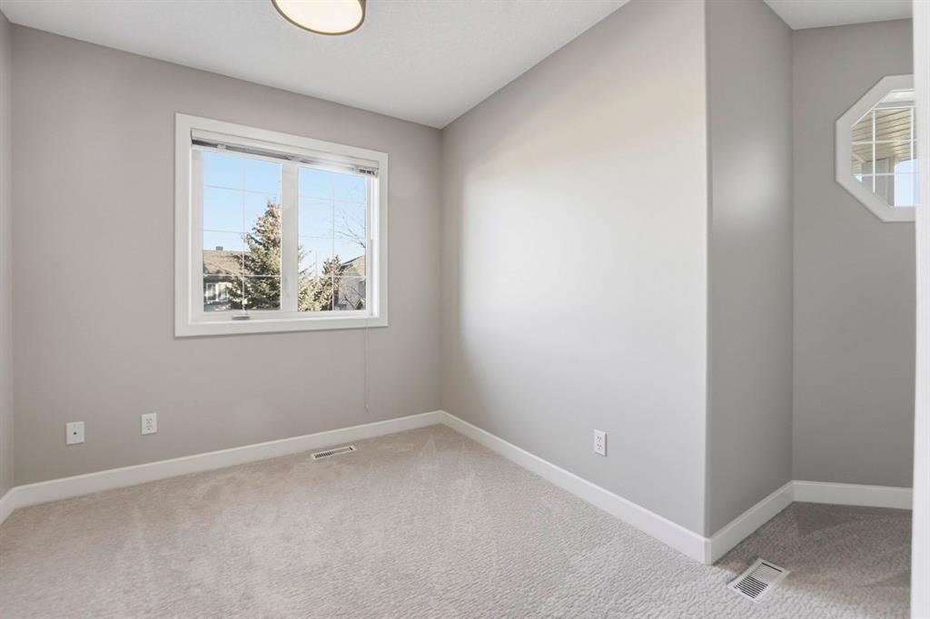 33 Prominence Park Sw, Calgary, AB - Indoor Photo Showing Other Room