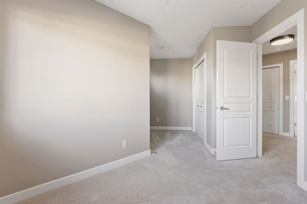 33 Prominence Park Sw, Calgary, AB - Indoor Photo Showing Other Room