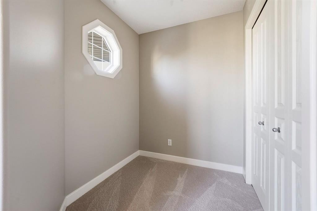 33 Prominence Park Sw, Calgary, AB - Indoor Photo Showing Other Room
