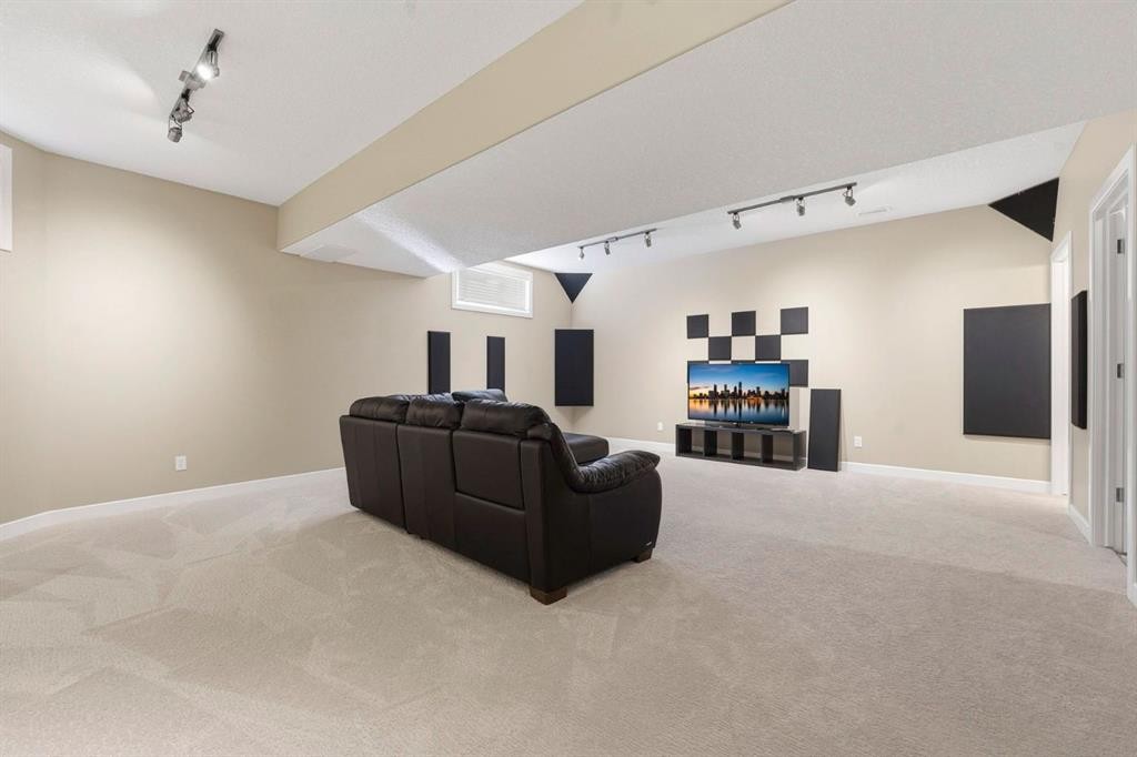 33 Prominence Park Sw, Calgary, AB - Indoor With Fireplace