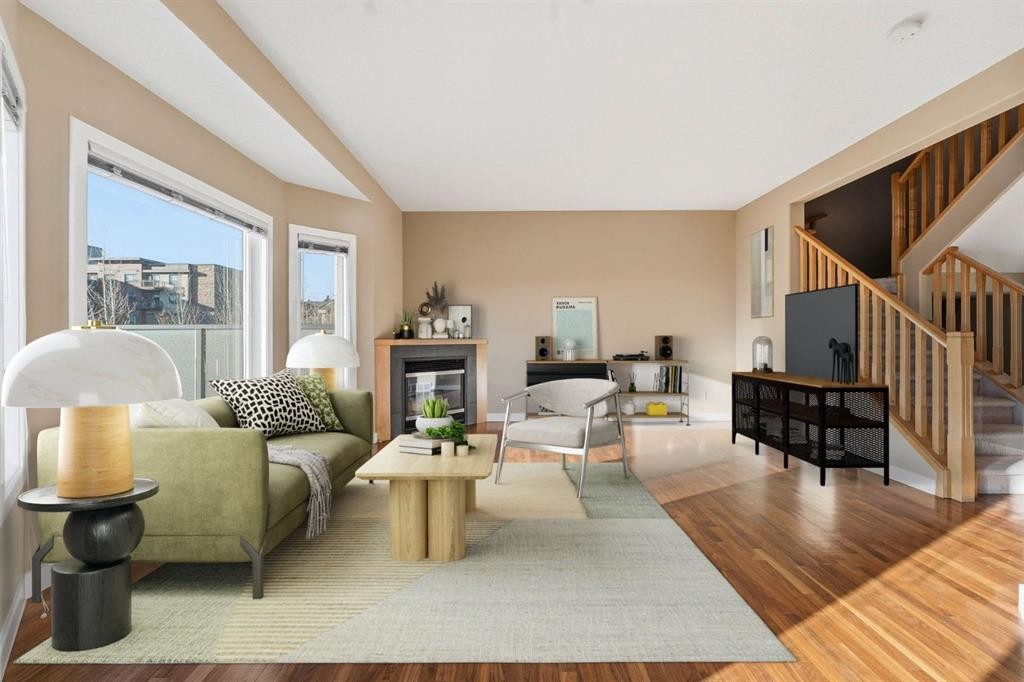33 Prominence Park Sw, Calgary, AB - Indoor Photo Showing Living Room With Fireplace