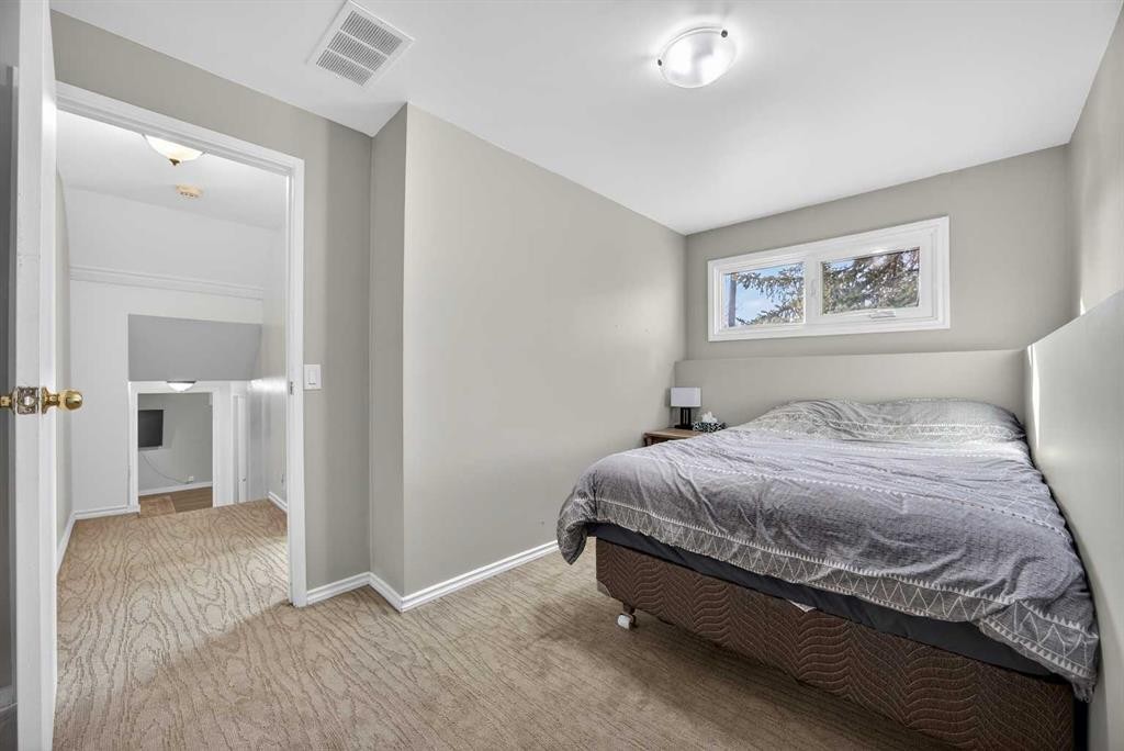 98 Ranch Glen Drive Nw, Calgary, AB - Indoor Photo Showing Bedroom
