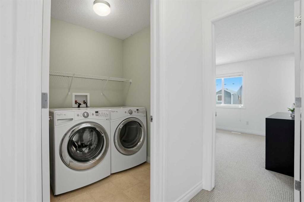 49 Williamstown Green Nw, Airdrie, AB - Indoor Photo Showing Laundry Room