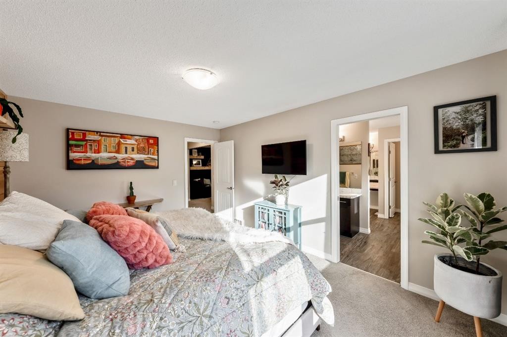 159 Riviera View, Cochrane, AB - Indoor Photo Showing Bedroom