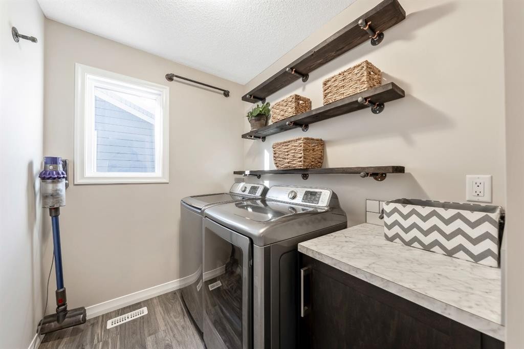 159 Riviera View, Cochrane, AB - Indoor Photo Showing Laundry Room